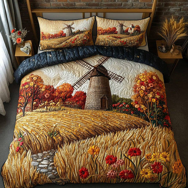 Golden Fields quilted 3-piece bedding set on a made bed with two matching pillow shams