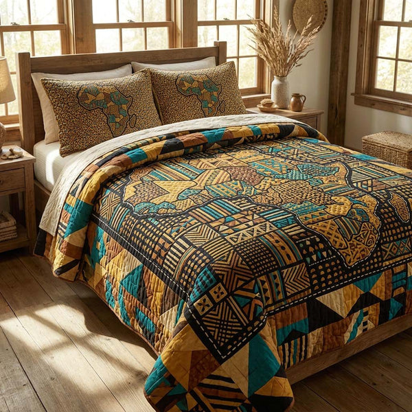 Golden Figures quilted 3-piece bedding set on a made bed with two matching pillow shams