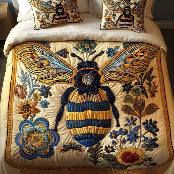 Golden Flight quilted 3-piece bedding set on a made bed with two matching pillow shams