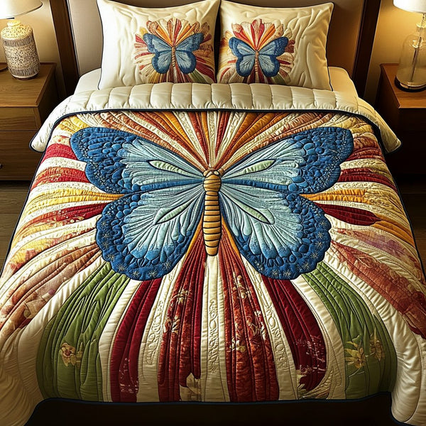 Golden Flutter quilted 3-piece bedding set on a made bed with two matching pillow shams