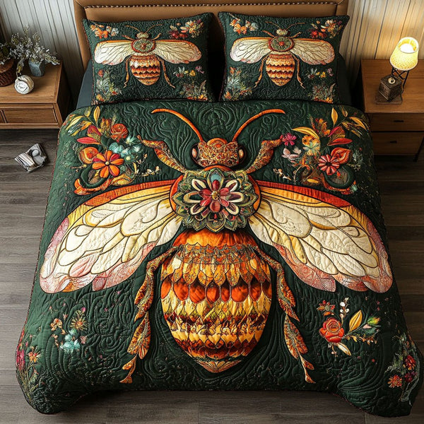 Golden Garden Bee quilted 3-piece bedding set on a made bed with two matching pillow shams