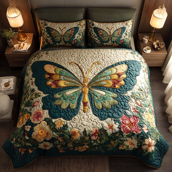 Golden Garden Muse quilted 3-piece bedding set on a made bed with two matching pillow shams