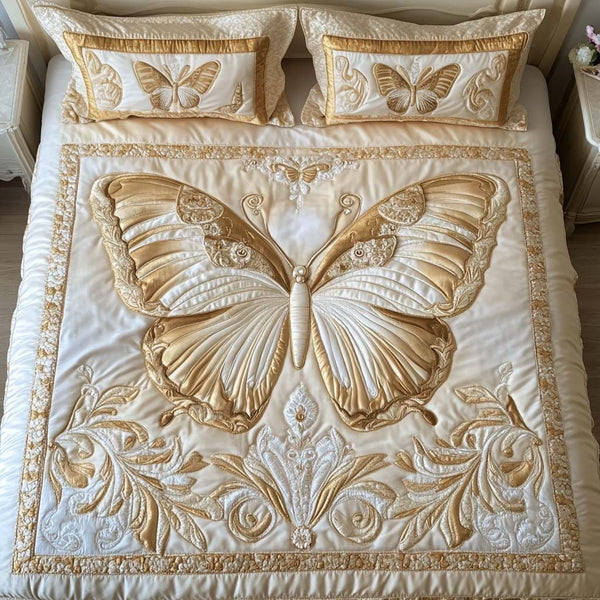 Golden Grace quilted 3-piece bedding set on a made bed with two matching pillow shams