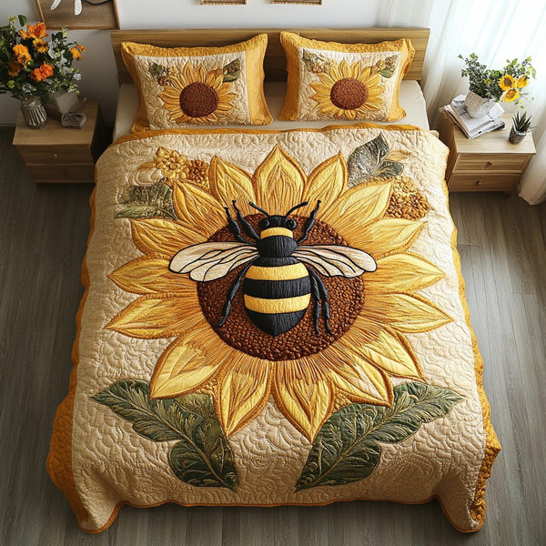 Golden Hive Magic quilted 3-piece bedding set on a made bed with two matching pillow shams