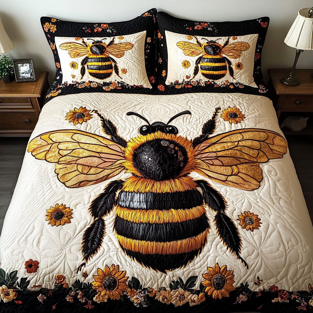 Golden Hive quilted 3-piece bedding set on a made bed with two matching pillow shams