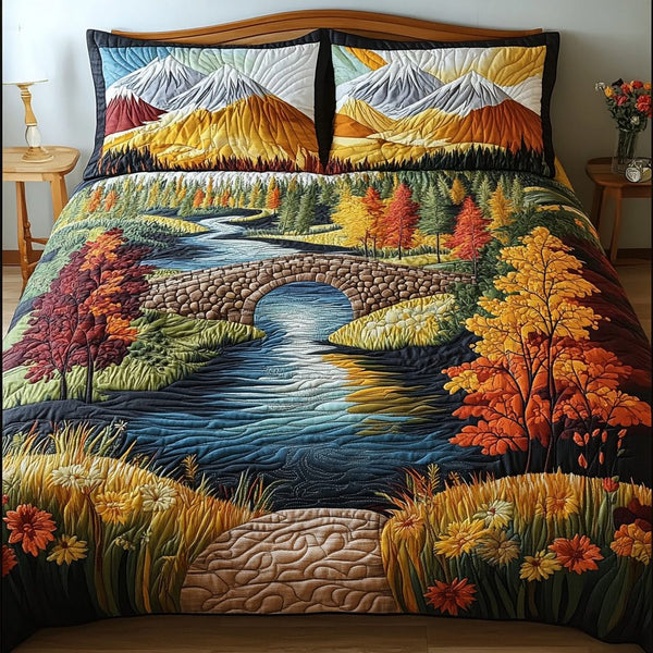 Golden Horizons quilted 3-piece bedding set on a made bed with two matching pillow shams