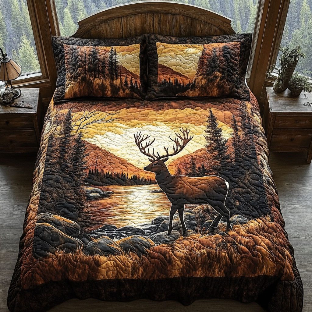 Golden Hour Elk quilted 3-piece bedding set on a made bed with two matching pillow shams