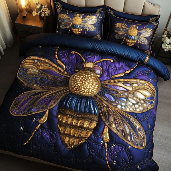 Golden Jewel Bee quilted 3-piece bedding set on a made bed with two matching pillow shams