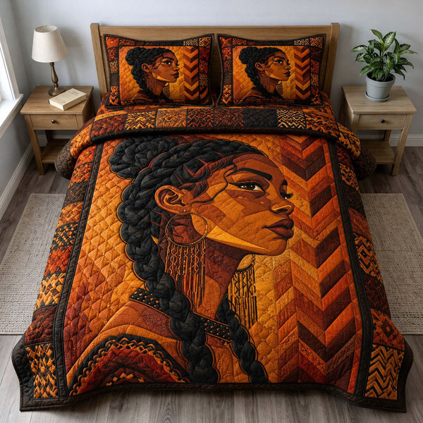 Golden Kente Queen quilted 3-piece bedding set on a made bed with two matching pillow shams