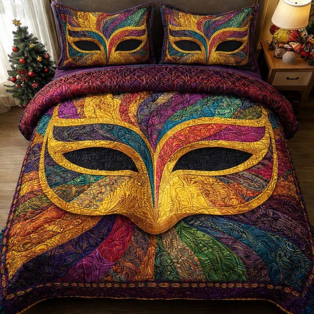 Golden Masque quilted 3-piece bedding set on a made bed with two matching pillow shams