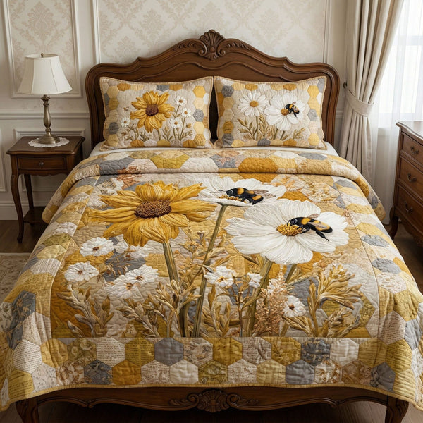 Golden Meadow Bloom quilted 3-piece bedding set on a made bed with two matching pillow shams