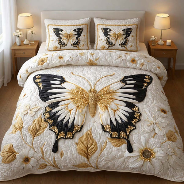 Golden Monarch quilted 3-piece bedding set on a made bed with two matching pillow shams