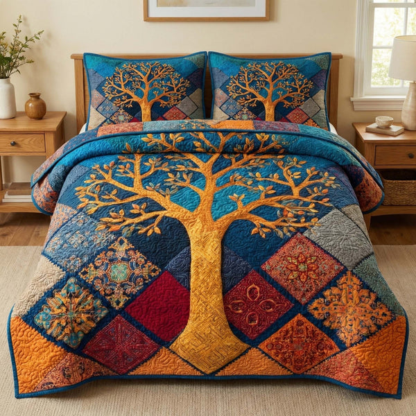 Golden Mosaic Tree quilted 3-piece bedding set on a made bed with two matching pillow shams