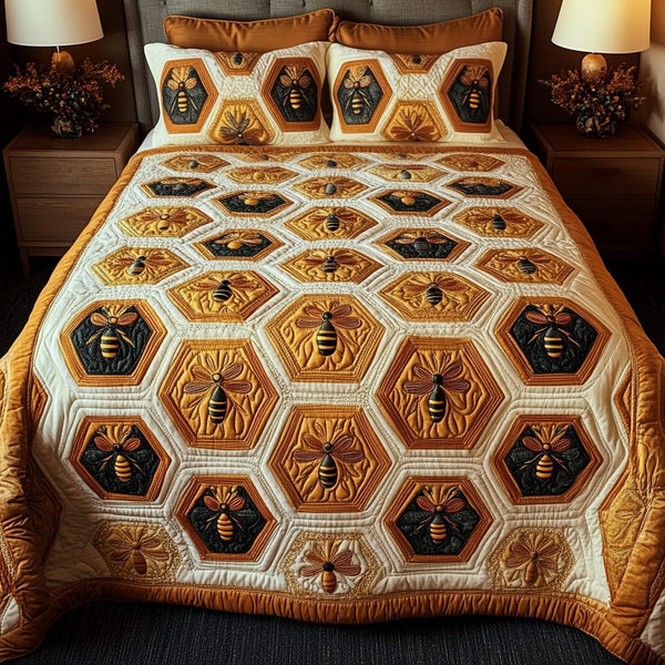 Golden Nectar quilted 3-piece bedding set on a made bed with two matching pillow shams