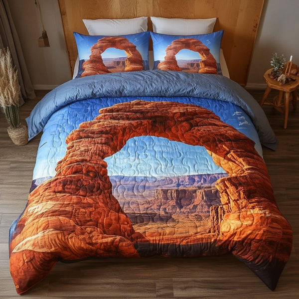 Golden Nevada Vista quilted 3-piece bedding set on a made bed with two matching pillow shams