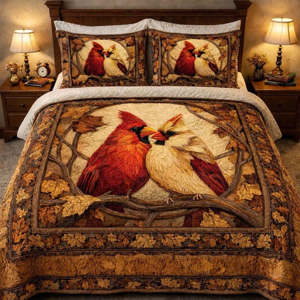 Golden Oak Cardinals quilted 3-piece bedding set on a made bed with two matching pillow shams
