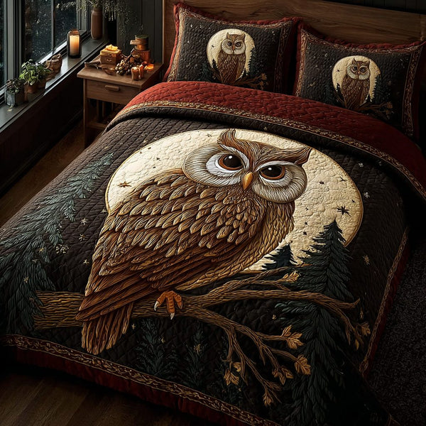 Golden Owl quilted 3-piece bedding set on a made bed with two matching pillow shams