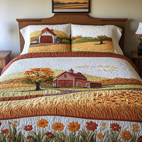 Golden Petals of Fall quilted 3-piece bedding set on a made bed with two matching pillow shams