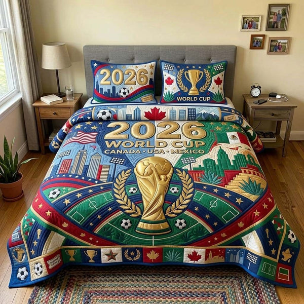 Golden Pitch quilted 3-piece bedding set on a made bed with two matching pillow shams