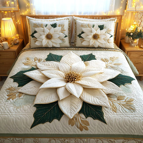 Golden Poinsettia Bloom quilted 3-piece bedding set on a made bed in a winter-styled bedroom