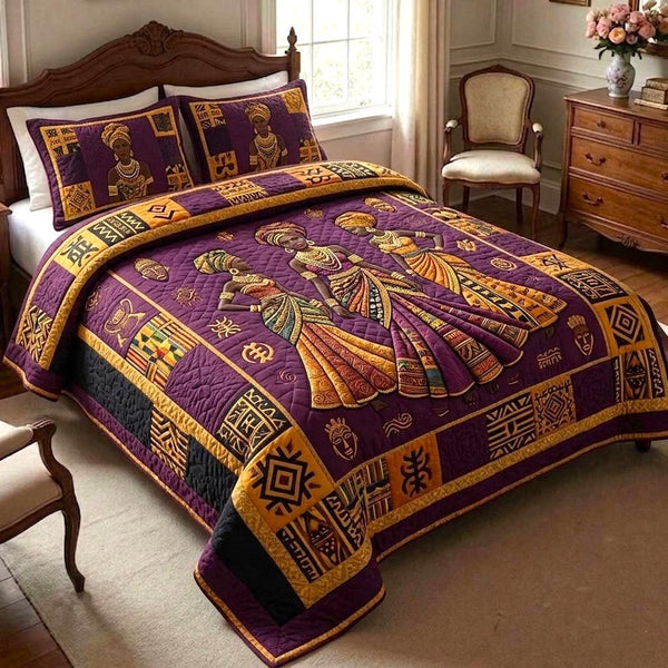 Golden Queen quilted 3-piece bedding set on a made bed with two matching pillow shams