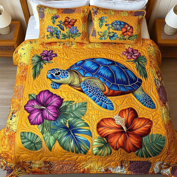 Golden Reef quilted 3-piece bedding set on a made bed in a light coastal bedroom