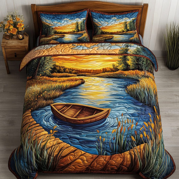Golden River quilted 3-piece bedding set on a made bed with two matching pillow shams
