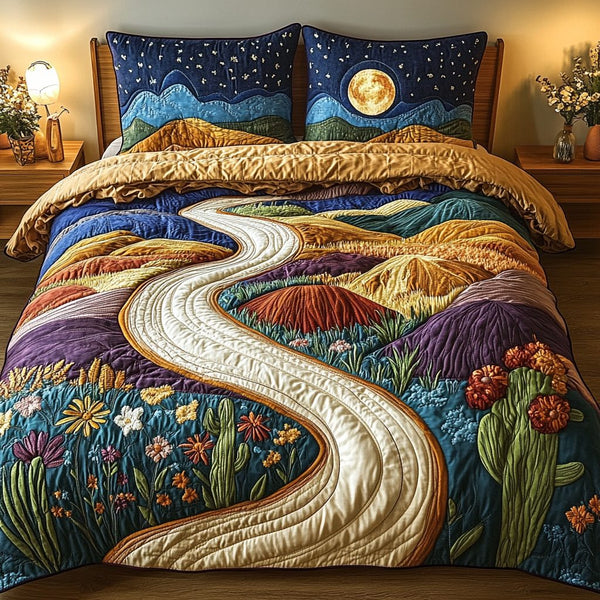 Golden Road quilted 3-piece bedding set on a made bed with two matching pillow shams