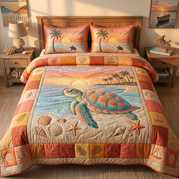 Golden Shore Turtle quilted 3-piece bedding set on a made bed in a light coastal bedroom
