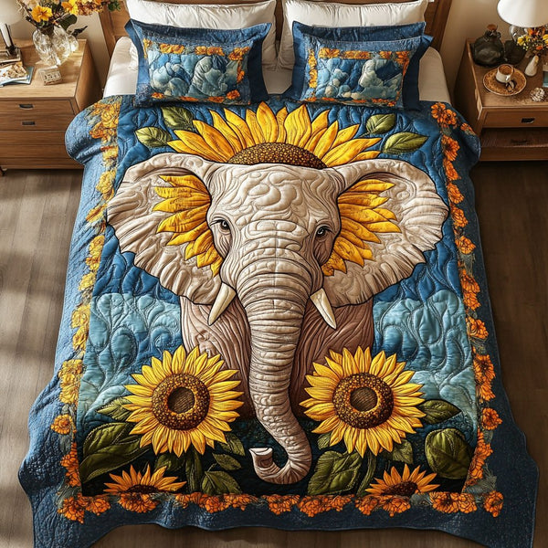 Golden Sunflower Elephant quilted 3-piece bedding set on a made bed with two matching pillow shams