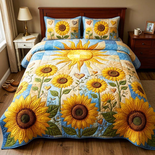 Golden Sunrise quilted 3-piece bedding set on a made bed with two matching pillow shams