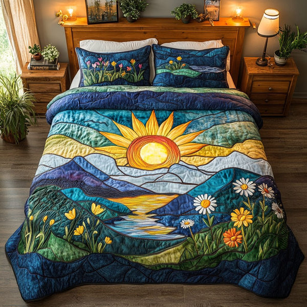 Golden Sunrise quilted 3-piece bedding set on a made bed with two matching pillow shams
