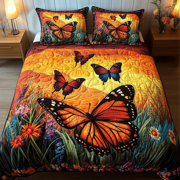 Golden Sunset Flight quilted 3-piece bedding set on a made bed with two matching pillow shams