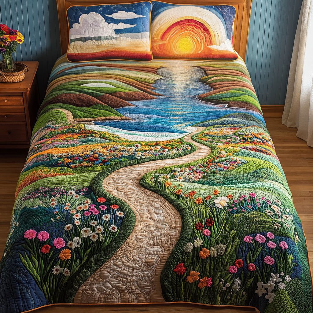 Golden Sunset Trail quilted 3-piece bedding set on a made bed with two matching pillow shams