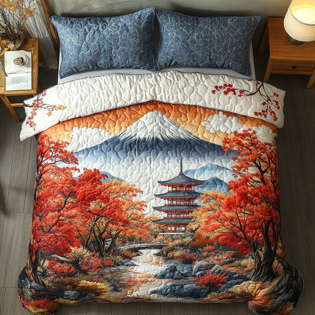 Golden Temple Trail quilted 3-piece bedding set on a made bed with two matching pillow shams