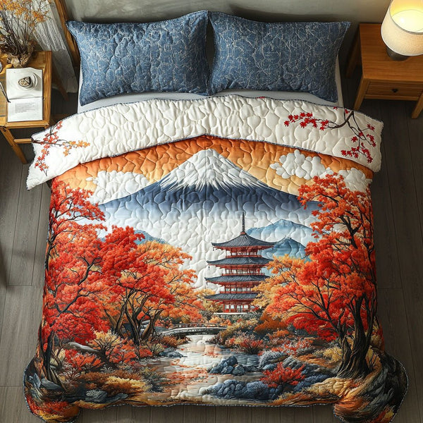 Golden Temple Trail quilted 3-piece bedding set on a made bed with two matching pillow shams