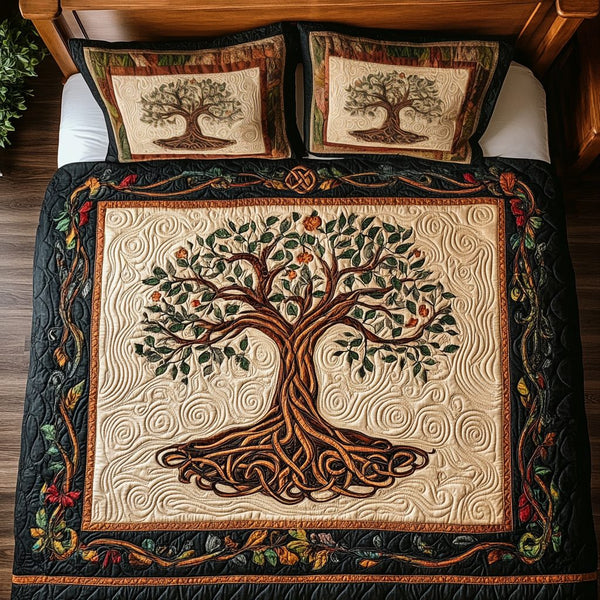 Golden Tree of Life quilted 3-piece bedding set on a made bed with two matching pillow shams