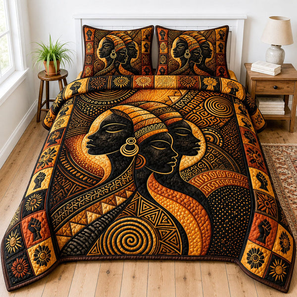 Golden Tribal Queens quilted 3-piece bedding set on a made bed with two matching pillow shams