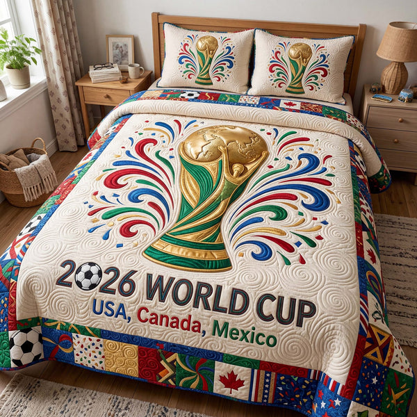 Golden Victory quilted 3-piece bedding set on a made bed with two matching pillow shams