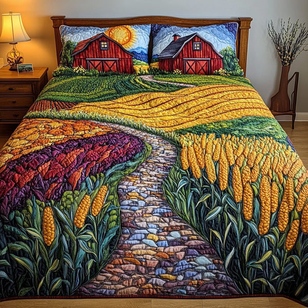 Golden Wheat Fields quilted 3-piece bedding set on a made bed with two matching pillow shams