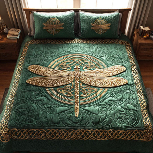 Golden Wings quilted 3-piece bedding set on a made bed with two matching pillow shams