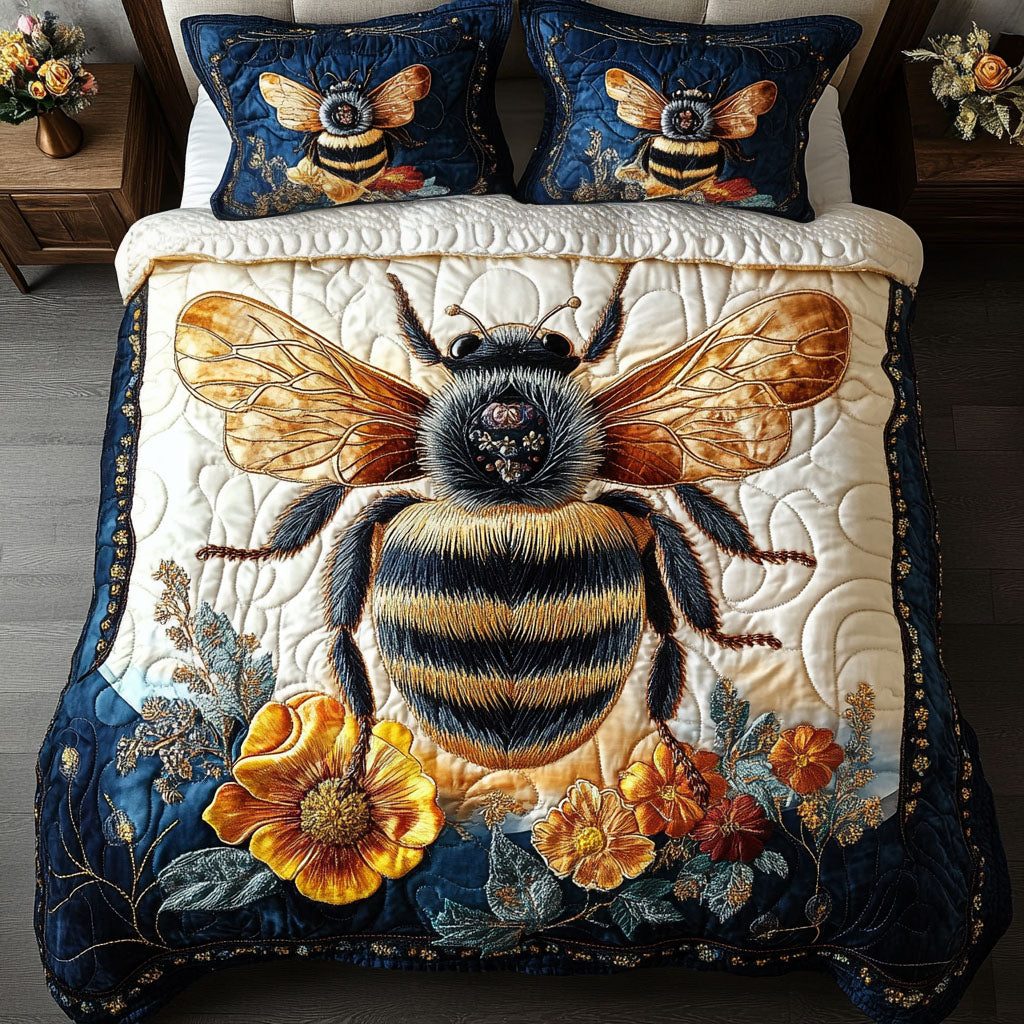 Golden Wings Whisper quilted 3-piece bedding set on a made bed with two matching pillow shams