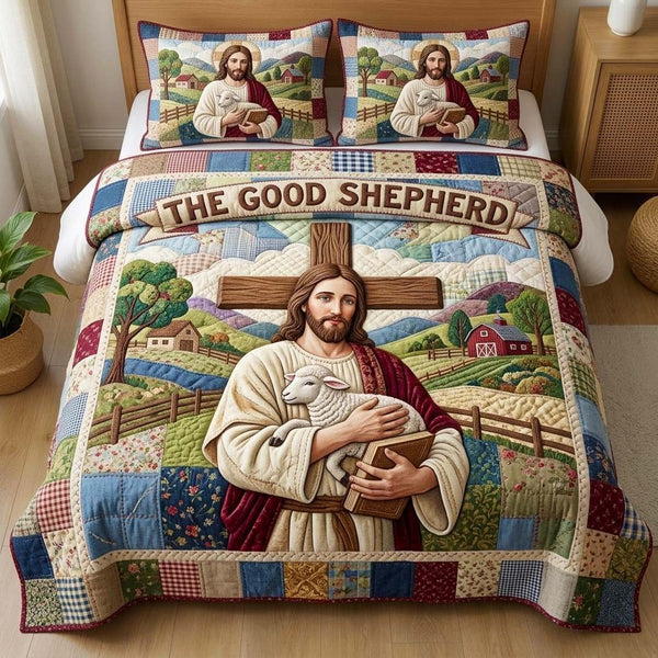 Good Shepherd quilted 3-piece bedding set on a made bed with two matching pillow shams