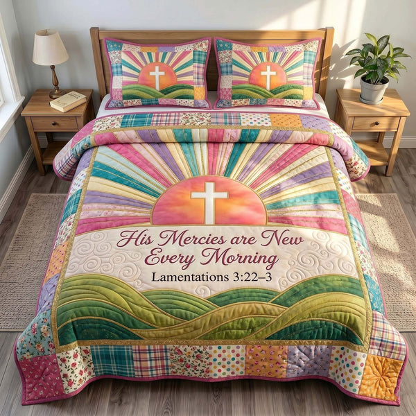 Grace In Bloom quilted 3-piece bedding set on a made bed with two matching pillow shams