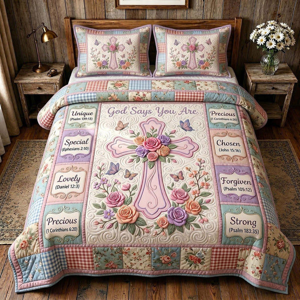 Grace In Bloom quilted 3-piece bedding set on a made bed with two matching pillow shams