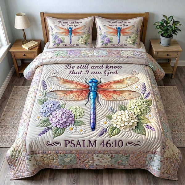 Grace In Flight quilted 3-piece bedding set on a made bed with two matching pillow shams