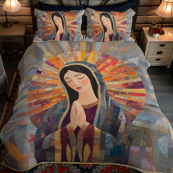 Graceful Devotion quilted 3-piece bedding set on a made bed with two matching pillow shams