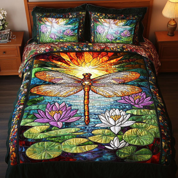 Graceful Dragonfly quilted 3-piece bedding set on a made bed with two matching pillow shams