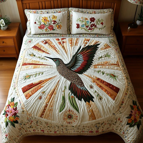 Graceful Horizon quilted 3-piece bedding set on a made bed with two matching pillow shams