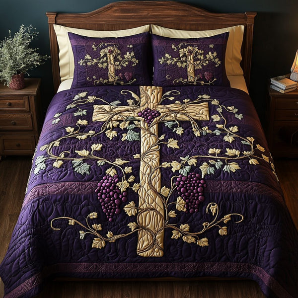 Grape Gold Cross quilted 3-piece bedding set on a made bed in a softly lit bedroom
